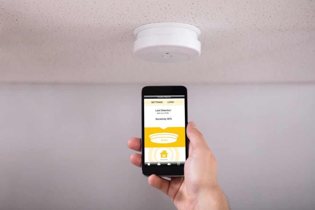 syncing mobile phone with a smoke alarm detector